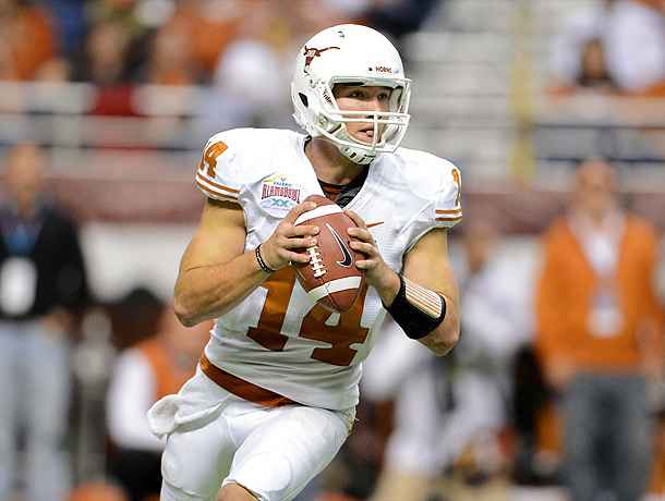 Texas QB David Ash will miss Saturday's game against No. 25 Ole Miss. (George Frey/Getty Images)